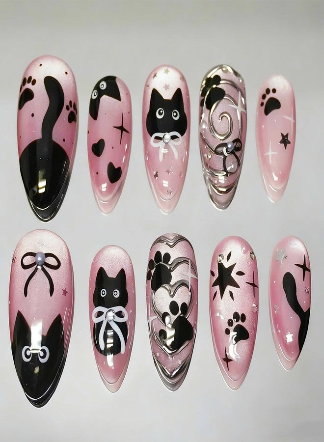 KRTBKR 24Pcs Cute Cat Press on Nails Medium Almond Pink Fake Nails Black Cat Bow with Pearl Design Full Cover Glue on Nails Artificial Reusable Silver Heart False Nails for Women Acrylic Manicure Decorations - Image 1